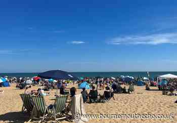 Bournemouth beachgoers enjoy warm weather on Saturday