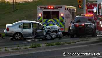 Tour bus and car involved in crash in northwest Calgary
