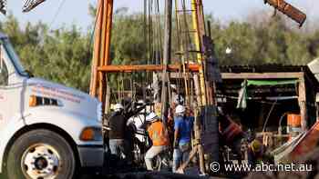 Relatives fear time is running out for 10 workers trapped in flooded Mexico mine