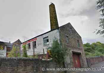 Firefighters tackle waste fire in derelict Burnley building