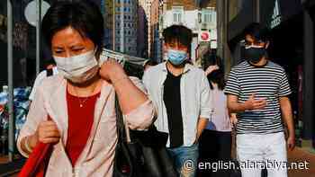 Hong Kong cuts coronavirus hotel quarantine for international arrivals - Al Arabiya English