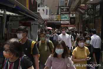 Hong Kong cuts coronavirus hotel quarantine for arrivals to 3 days - Yahoo News