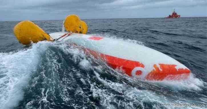 Rescue Ship Pulls Up to Scene of No Hope, But Diver Listens to the Side of Capsized Boat and Realizes There's Still a Chance