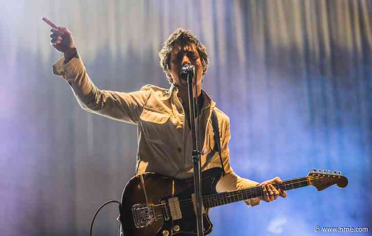 Arctic Monkeys return to the stage with a glittering disco ball for first gig since 2019