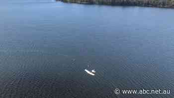 Men winched to safety after seaplane crashes into southern New South Wales lake