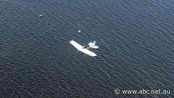 Men winched to safety after seaplane crashes into southern NSW lake