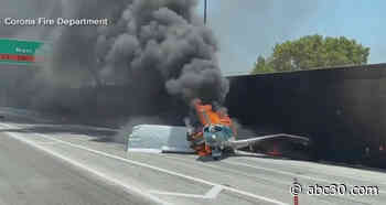 2 escape after plane lands, catches fire on Southern California freeway