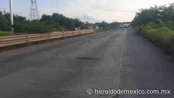 Cierran autopista Guadalajara-Manzanillo por joven desaparecido - El Heraldo de México