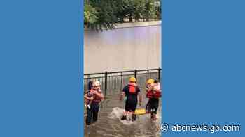 WATCH:  Children rescued from submerged vehicle amid Denver flooding
