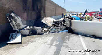 2 people escape burning wreckage after their plane crashes on California freeway