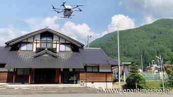 Japan looks to ensure safe flight of logistics drones over rivers - The Japan Times