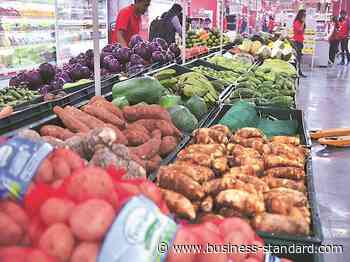 Indias retail inflation dips below 7% in July; IIP growth in double digits - Business Standard
