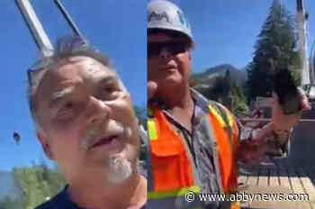 Man worried about nearby fish confronts Trans Mountain construction workers at Coquihalla River