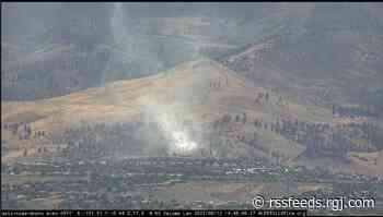 RFD contains brush fire in Pinehaven neighborhood; cause under investigation