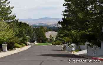 Reno police say they saw suspect reach for his handgun before they shot him