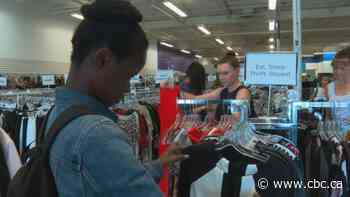 Busload of shoppers support women's charity at Calgary thrift crawl event