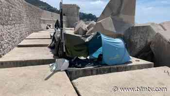Nice: le camp de migrants de la digue du port démantelé, leurs affaires jetées - BFMTV