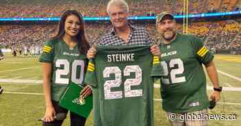 Global’s Gord Steinke receives honourary Edmonton Elks jersey as retirement gift