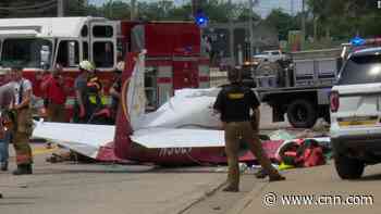 2 people died after a small plane crashed into a building in Illinois, officials say