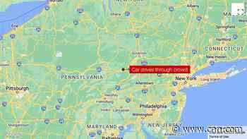 1 person is dead and 17 injured after a car drove through a crowd