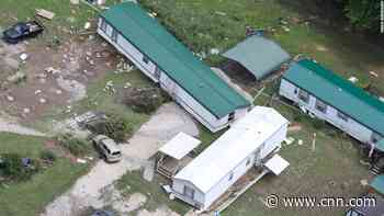 The FEMA maps showed they weren't in a flood zone, but the waist-high water showed otherwise