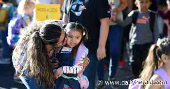 Smiles, hugs and a few teary parents welcome school year in U-46