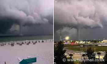 Moment a colossal waterspout is spotted off the coast of Florida's Panhandle