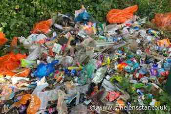 Litter pickers find rubbish emptied back on to the floor by Sutton Mill Dam - St Helens Star