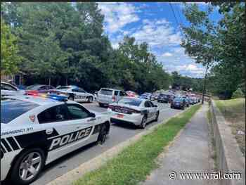 Tense scene in Durham, where dozens of police are gathered after a fatal shooting
