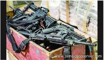 ‘Rev’ to face charges in massive Kingston gun find - Jamaica Observer