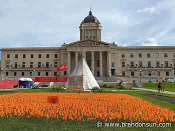 Eviction warnings handed to longtime Manitoba legislature encampments - The Brandon Sun