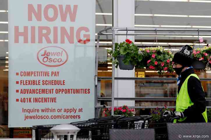 US jobless claims tick down