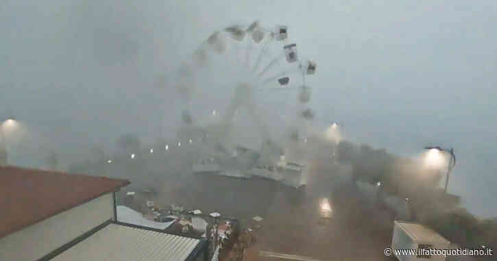 Crisi climatica, a Piombino la furia della tempesta investe la ruota panoramica: le cabine volano via – Video