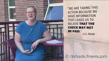 Coloradans started cashing TABOR checks, but some funds are put on hold