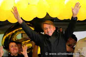 Brazil's Bolsonaro grabs at heckler and tries to take phone - St Helens Star