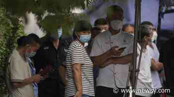 WHO: World Coronavirus Cases Fall 24%, Deaths Rise In Asia - Newsy