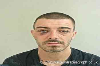 Man wanted for criminal damage and threats to kill found in Blackburn McDonalds