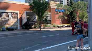 Truck driver flees after crashing into downtown Calgary Co-op - CBC.ca