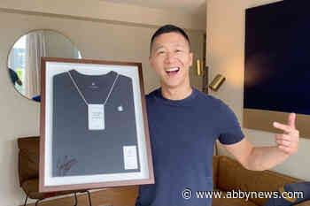 Former B.C. Apple Store employee Sam Sung auctioning off business card for charity