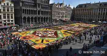 Activisten vertrappelen bloementapijt op Grote markt | Brussel | hln.be - Het Laatste Nieuws