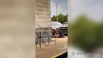 2 deputies suspended and 1 officer on administrative leave after video posted of violent encounter with man outside store