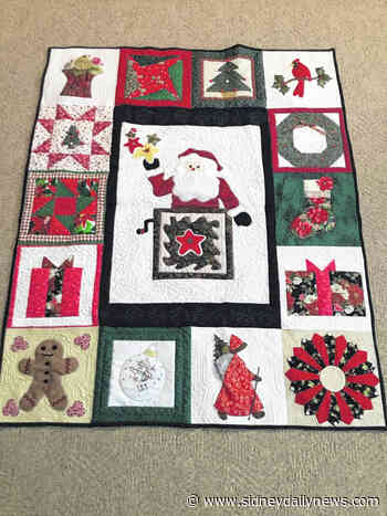 Quilting ladies ready for raffle - sidneydailynews.com