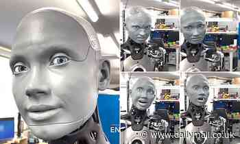 Humanoid robot Ameca seen winking, pursing its lips, scrunching its nose and grimacing in a mirror