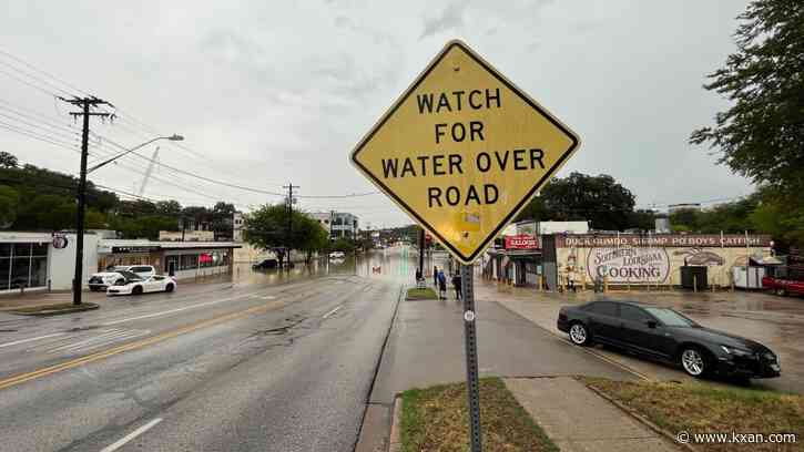 How did Monday's rain go down in the record books?