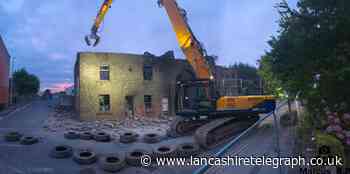 Demolition work begins on fire ravaged Accrington warehouse