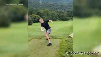WATCH:  'Hole-in-one' breaks disc golf record