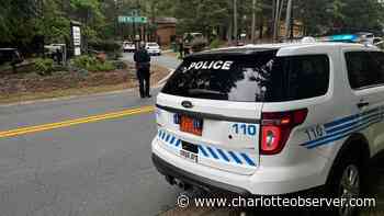 Woman shoots at CMPD officers in south Charlotte, hitting one in vest, police say - Charlotte Observer