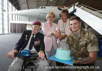 World War II hero returns to airport for surprise 100th birthday