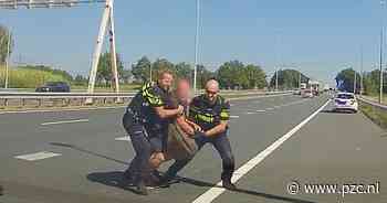 Heldhaftige agenten halen verwarde man van snelweg: 'Ik dacht: ik kan hem nog pakken' - Provinciale Zeeuwse Courant