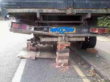 Anger over cars 'dumped' in Luton street - including one on bricks with wheels removed blocking a cycle lane - Luton Today